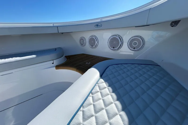 Slide: The Image of 2026 Valhalla Boatworks V-46 interior with quilted seating and marine speakers. - 41