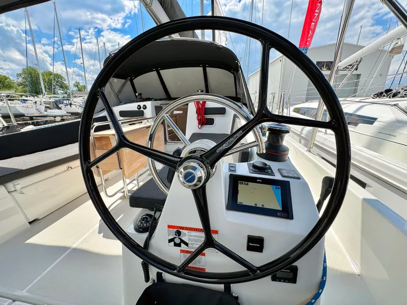 Slide: The Image of Jeanneau Sun Odyssey 380 steering wheel, 2023 model, docked at marina. - 14
