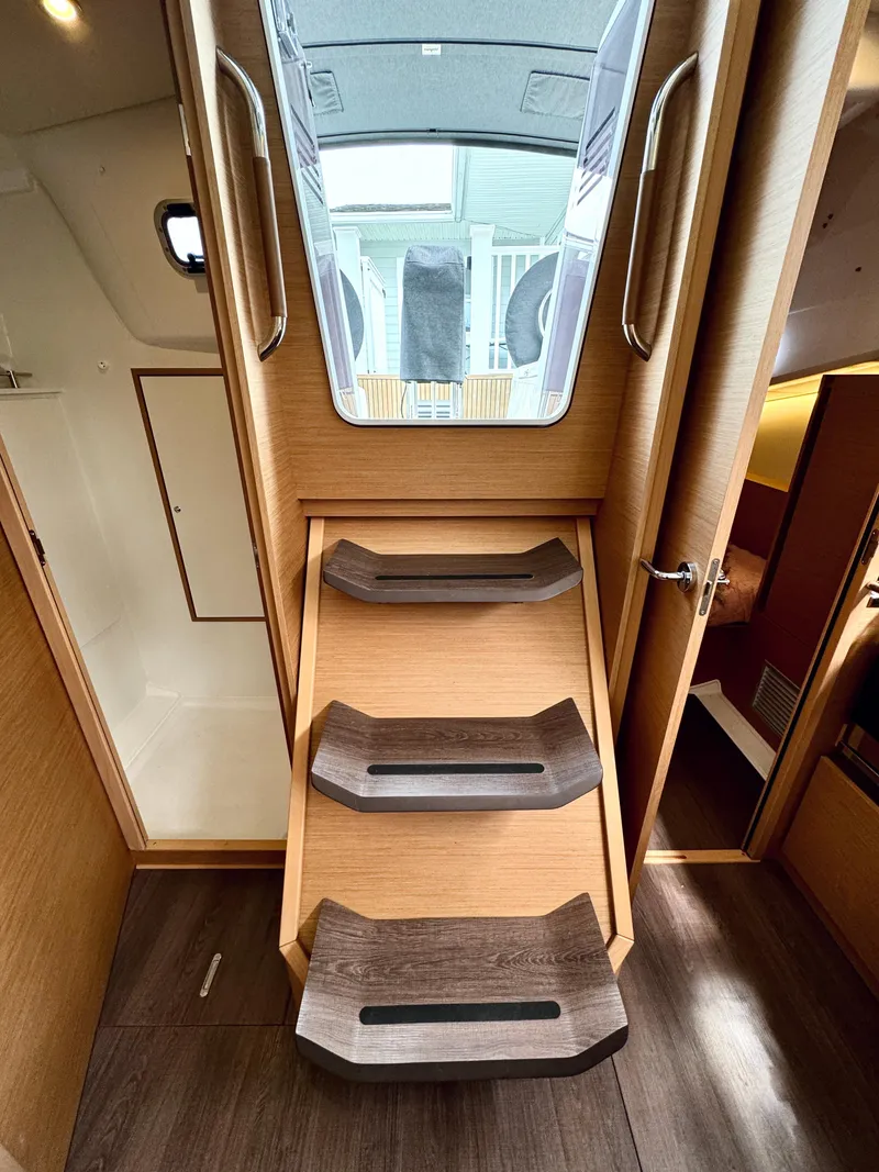 Slide: The Image of Interior of Jeanneau Sun Odyssey 380 yacht, cabin stairs, 2023 model. - 19