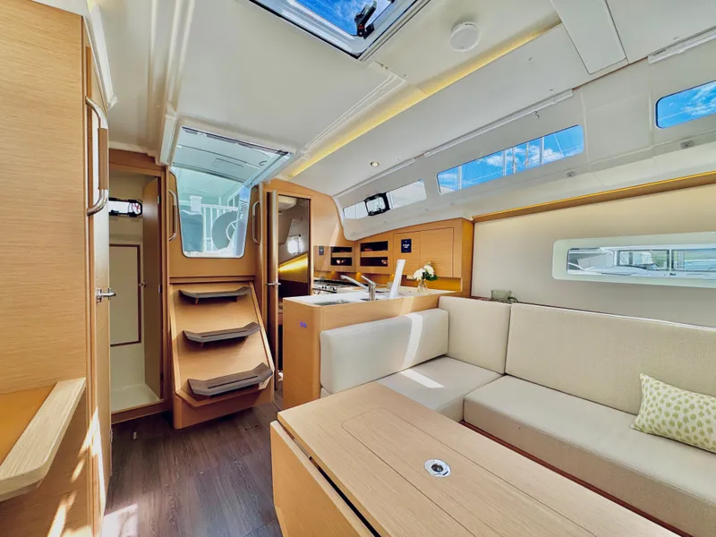 Slide: The Image of Interior of 2023 Jeanneau Sun Odyssey 380 yacht with modern furnishings. - 26