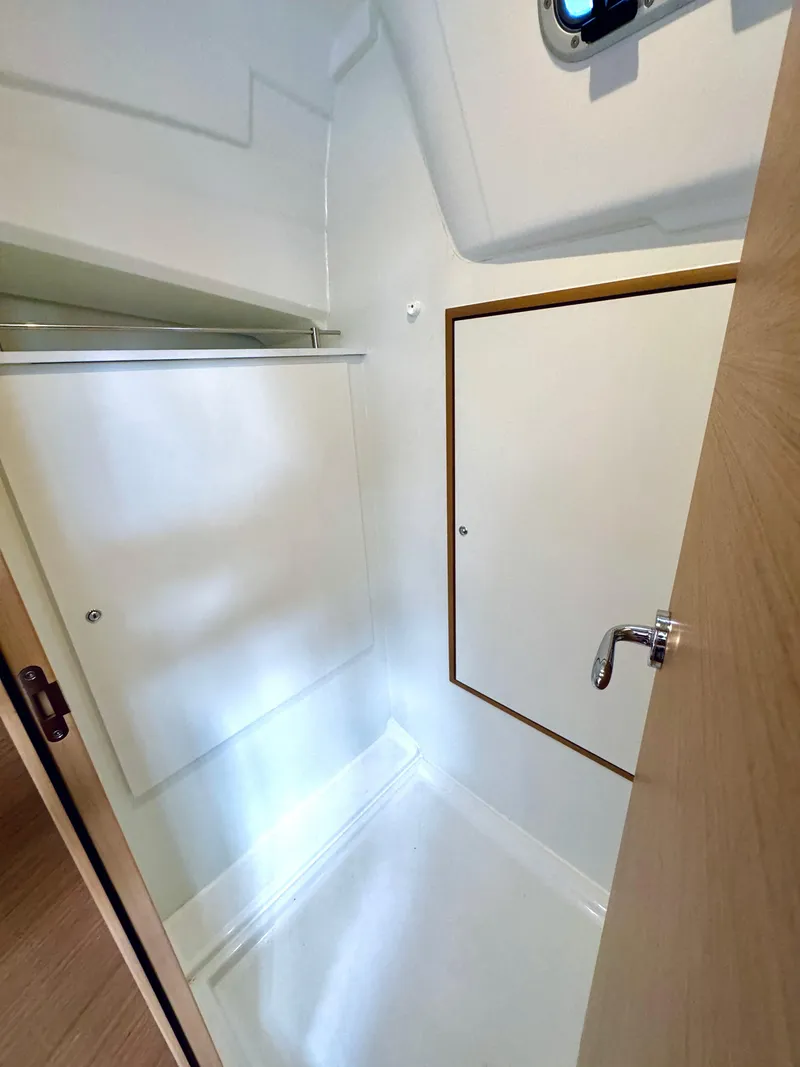 Slide: The Image of Interior of Jeanneau Sun Odyssey 380, 2023, featuring storage space. - 30