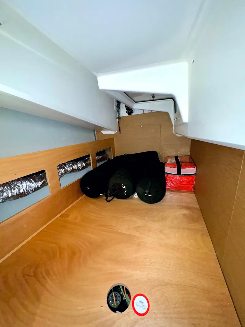 Slide: The Image of Interior of Jeanneau Sun Odyssey 380, 2023 model, featuring storage space. - 32