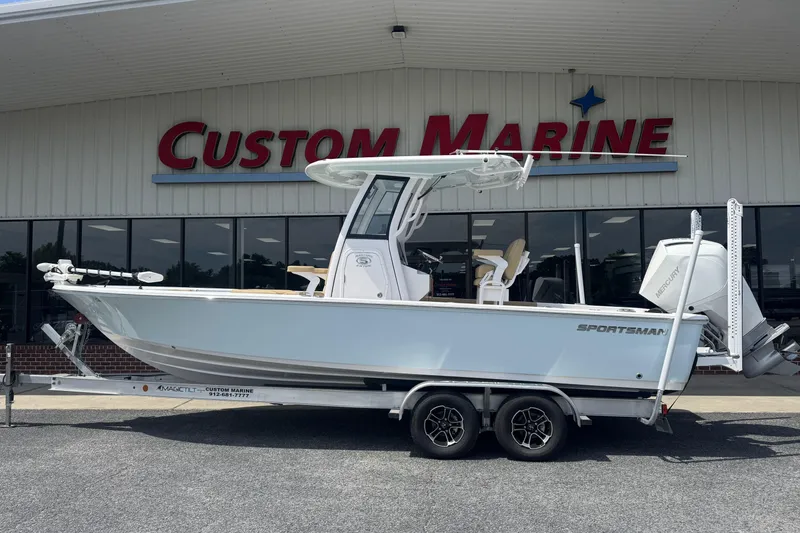 The Image of 2025 Sportsman Masters 247OE Bay Boat displayed at Custom Marine dealership. - 2