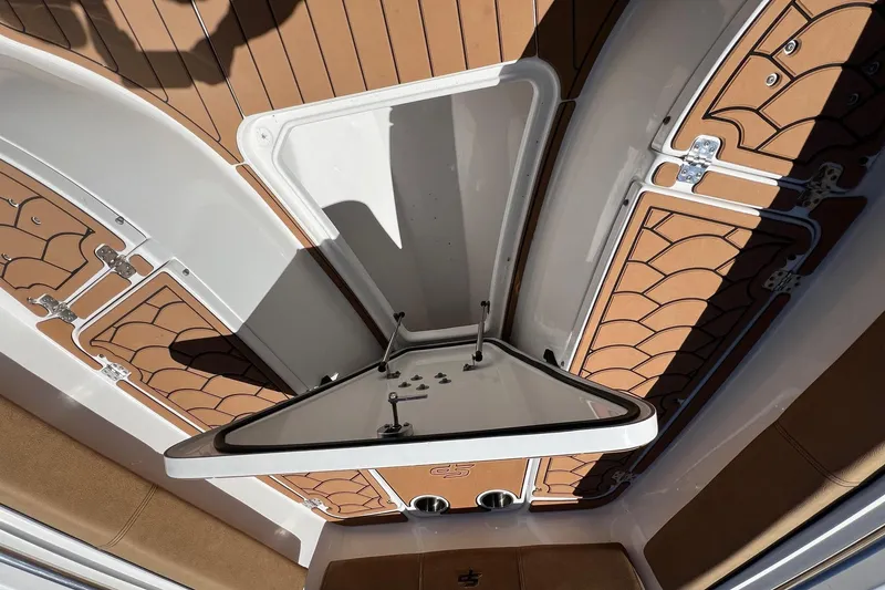 Slide: The Image of 2021 Sea Pro 239 Center Console boat interior with open storage compartments. - 13