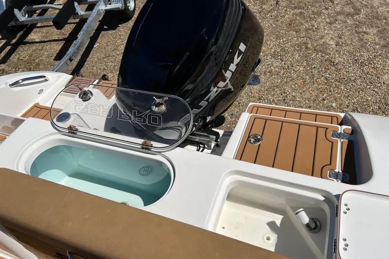 Slide: The Image of 2021 Sea Pro 239 Center Console boat with Suzuki engine and livewell. - 8