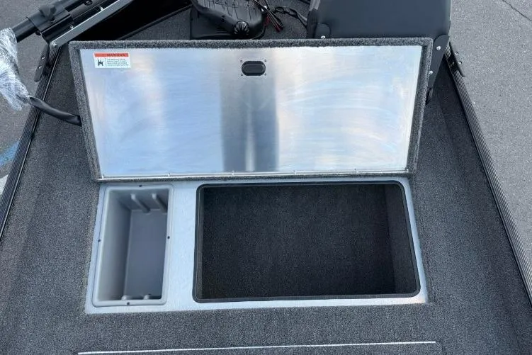 Slide: The Image of 2026 Crestliner 1700 Storm boat storage compartments, open and ready for use. - 5