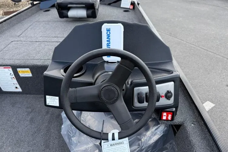 Slide: The Image of Steering console of 2026 Crestliner 1700 Storm boat with controls and navigation system. - 9