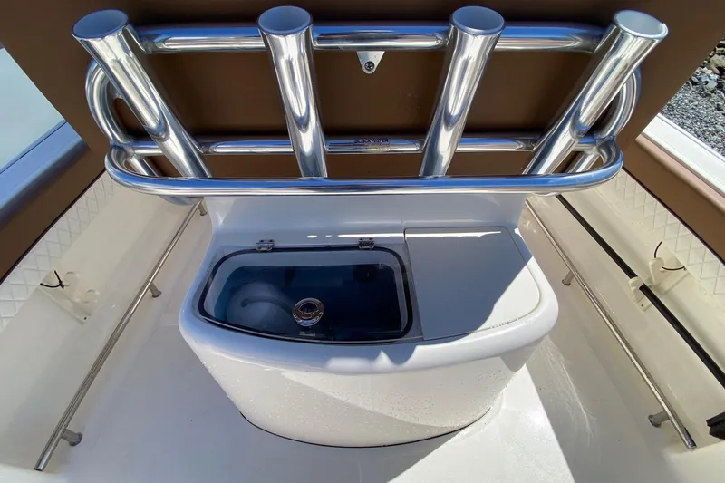 Slide: The Image of 2023 Pioneer 202 Sportfish boat with rod holders and livewell. - 14