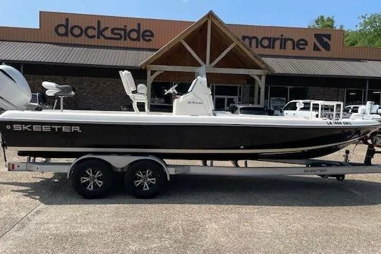 The Image of 2020 Skeeter SX240 boat on trailer outside Dockside Marine dealership. - 0