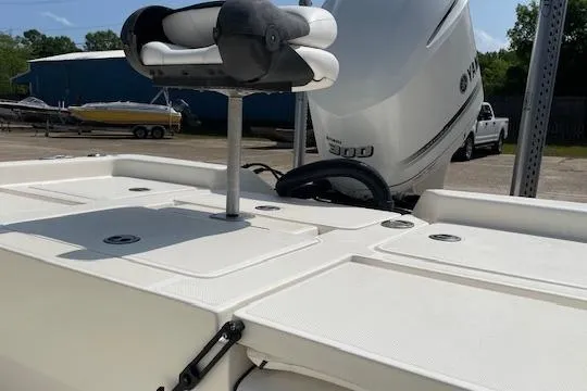 Slide: The Image of 2020 Skeeter SX240 boat with Yamaha 300 engine, docked outdoors. - 6