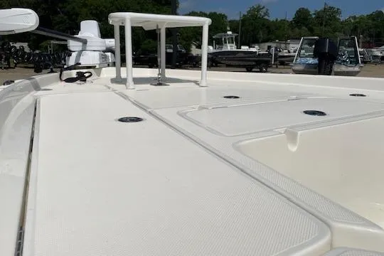 Slide: The Image of 2020 Skeeter SX240 boat deck with storage compartments and seating area. - 7