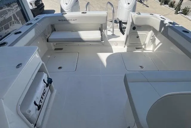 Slide: The Image of Spacious deck of 2026 World Cat 280 DC-X boat with seating and storage. - 6