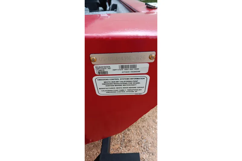 Slide: The Image of 2026 Tracker Pro Team 175 boat with emissions control information label. - 11