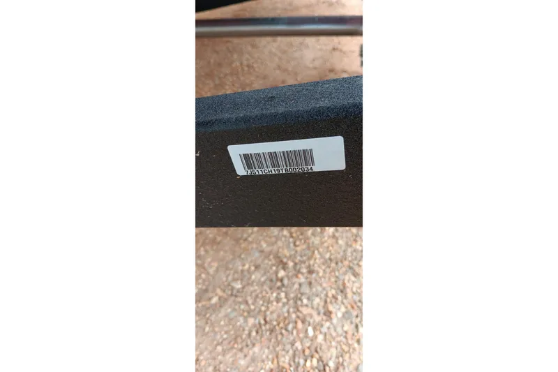 Slide: The Image of Barcode sticker on 2026 Tracker Pro Team 175 boat trailer. - 12