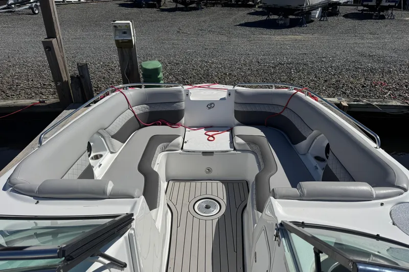Slide: The Image of 2019 Hurricane SunDeck 2486 OB boat interior with spacious seating and modern design. - 4