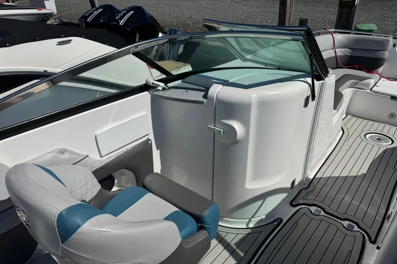 Slide: The Image of 2019 Hurricane SunDeck 2486 OB boat interior with seating and sleek design. - 5