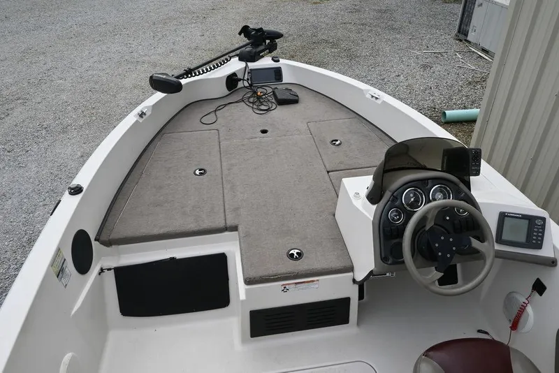 Slide: The Image of 2007 Ranger 1760 Angler boat interior with steering wheel and control panel. - 8