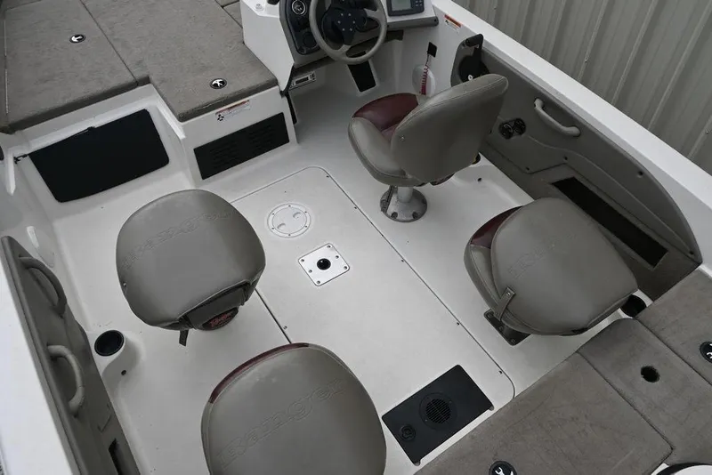 Slide: The Image of 2007 Ranger 1760 Angler boat interior with four seats and steering console. - 9