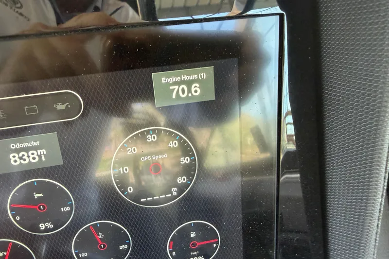 Slide: The Image of Dashboard of 2022 Cobalt R8 Surf showing 70.6 engine hours and 838 miles. - 4