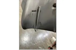 Slide: The Image of 2024 Nitro Z20 XL Pro boat hull detail in a workshop setting. - 18