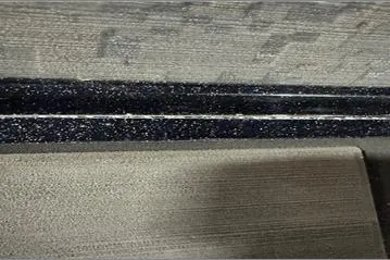 Slide: The Image of 2024 Nitro Z20 XL Pro boat interior with textured surfaces and sleek design. - 5