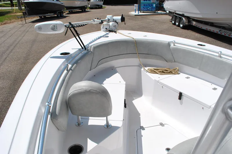 Slide: The Image of 2020 Sportsman Open 232 Center Console boat interior with seating and storage compartments. - 21