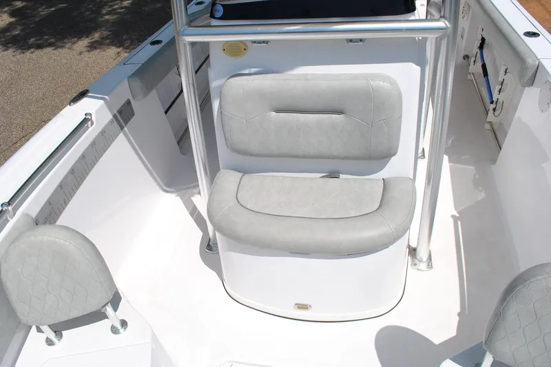 Slide: The Image of 2020 Sportsman Open 232 Center Console boat interior with cushioned seating. - 22