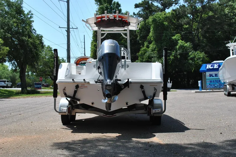 Slide: The Image of 2020 Sportsman Open 232 Center Console boat on trailer, rear view, parked outdoors. - 8