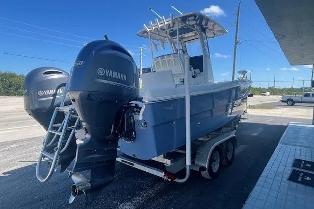 Slide: The Image of 2022 World Cat 235 CC boat with dual Yamaha engines on a trailer. - 3