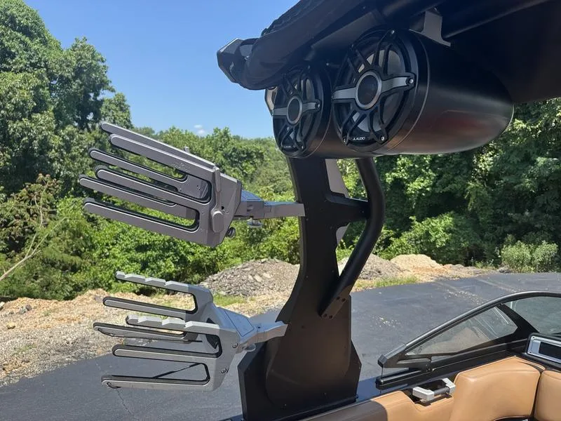 Slide: The Image of Wakeboard tower with speakers and racks on a 2020 Supra 450 SE boat. - 17