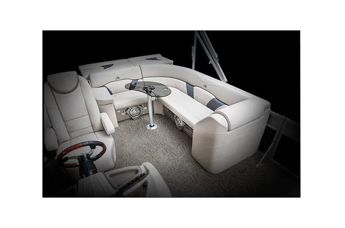 Slide: The Image of Manufacturer Provided Image: 2015 Avalon Windjammer Elite 25' interior with plush seating and steering console. - 21