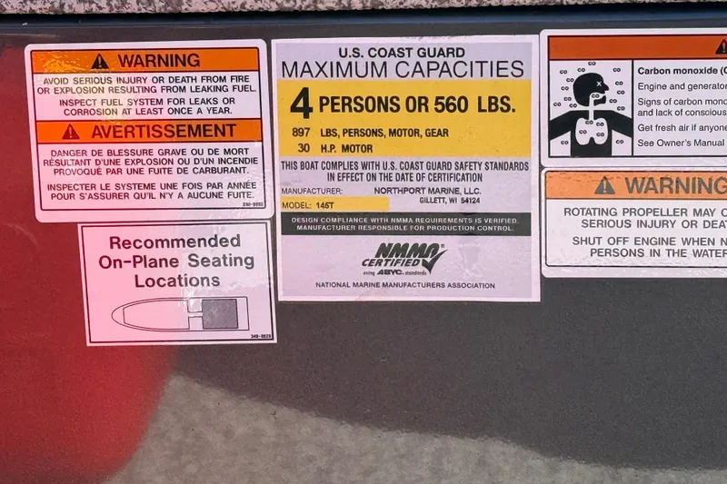 Slide: The Image of Safety and capacity labels on a 2020 MirroCraft 1415 Outfitter boat. - 2