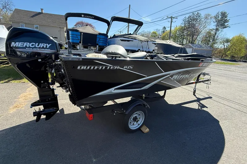 Slide: The Image of 2020 MirroCraft 1415 Outfitter boat with Mercury engine on trailer. - 4