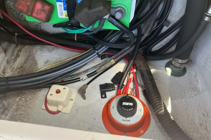 Slide: The Image of Electrical wiring and components inside a 1998 Grady-White Seafarer 226 boat. - 13