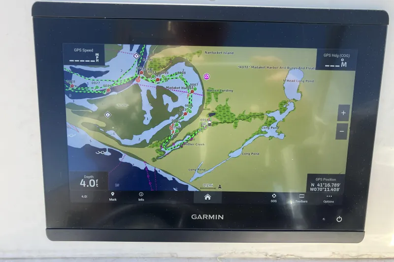 Slide: The Image of Garmin GPS display on 1998 Grady-White Seafarer 226, showing Nantucket Island navigation map. - 21