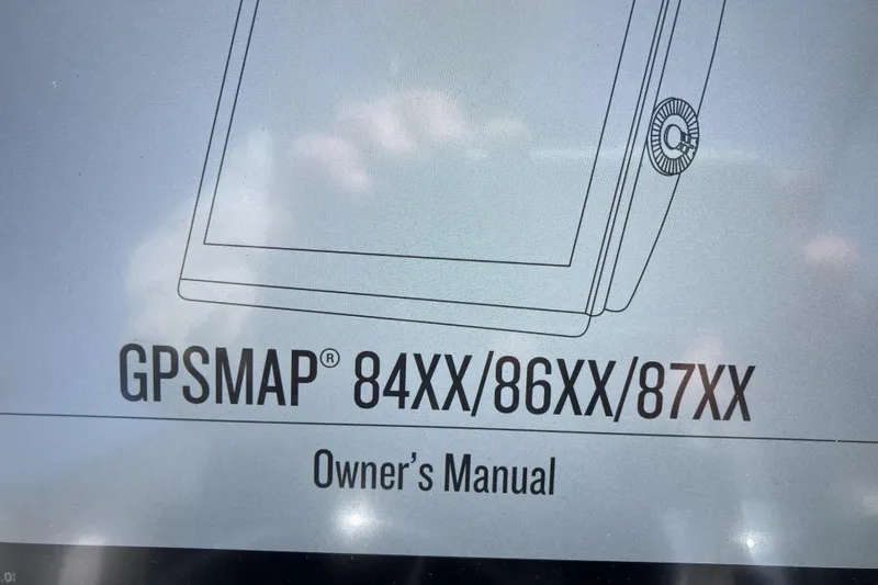 Slide: The Image of Owner's manual cover for GPSMAP models 84XX, 86XX, 87XX, Grady-White Seafarer 226. - 22