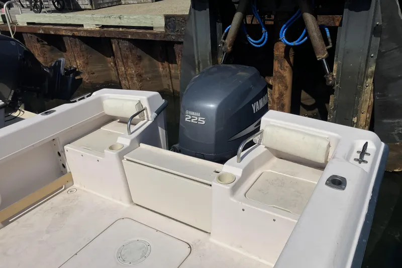 Slide: The Image of 1998 Grady-White Seafarer 226 boat with Yamaha 225 engine at dock. - 6