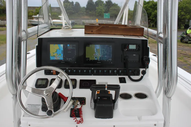 Slide: The Image of 2012 Sea Hunt Gamefish 27 boat seating with stainless steel rails. - 10