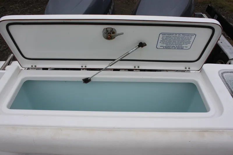 Slide: The Image of Twin Yamaha 150 outboard motors on a 2012 Sea Hunt Gamefish 27 boat. - 14