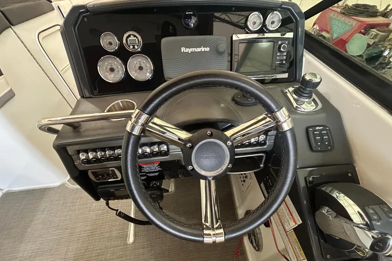 Slide: The Image of Steering console of 2015 Formula 310 Bowrider with gauges and navigation system. - 9