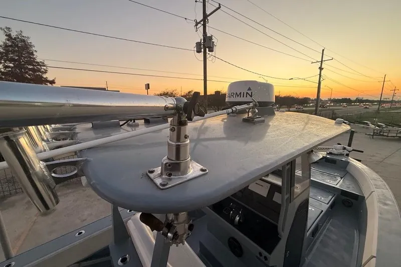 Slide: The Image of 2019 Metal Shark 28 CC boat with Garmin equipment at sunset. - 15