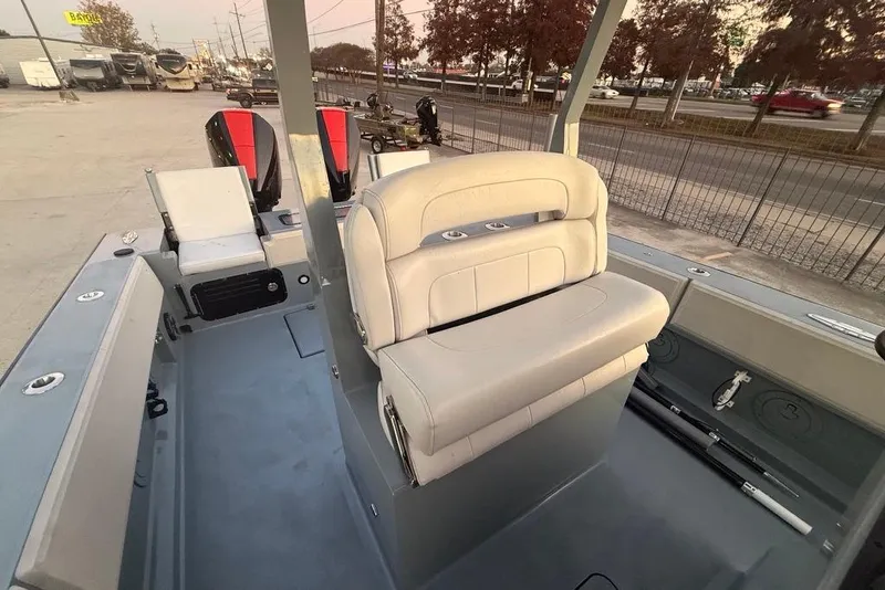 Slide: The Image of 2019 Metal Shark 28 CC boat interior with dual seats and modern design. - 17