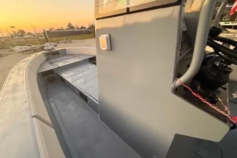 Slide: The Image of 2019 Metal Shark 28 CC boat deck at sunset, showcasing sleek design and modern features. - 20