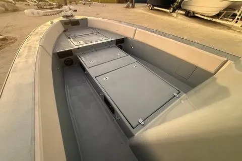 Slide: The Image of 2019 Metal Shark 28 CC boat interior with storage compartments. - 21