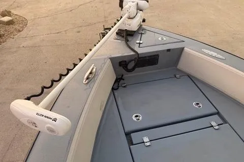 Slide: The Image of 2019 Metal Shark 28 CC boat with Minn Kota trolling motor on deck. - 26