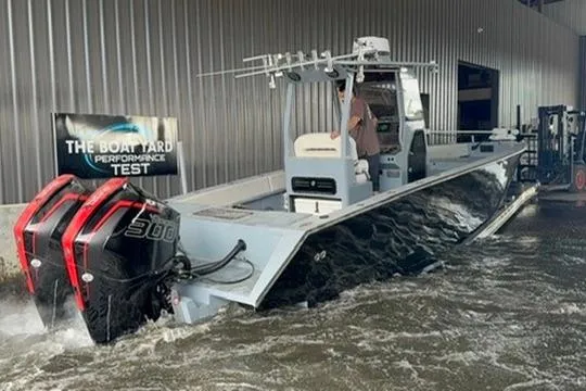 Slide: The Image of 2019 Metal Shark 28 CC boat undergoing performance test in water. - 4