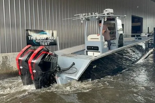 Slide: The Image of 2019 Metal Shark 28 CC boat undergoing performance test in water. - 8
