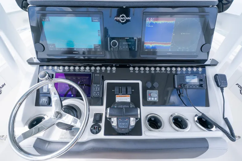 Slide: The Image of 2021 Fountain 38 Center Console dashboard with advanced navigation and control systems. - 33