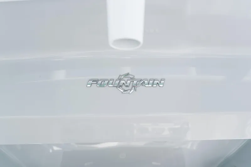 Slide: The Image of 2021 Fountain 38 Center Console boat logo on sleek white surface. - 41