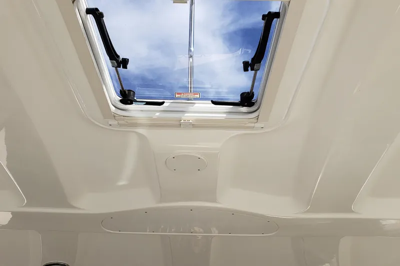 Slide: The Image of Skylight view from 2004 Sea Ray 550 Sundancer yacht interior. - 11